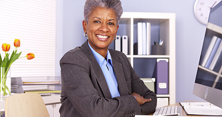 Woman at an office desk.