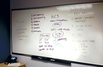 Photo, classroom whiteboard during a class session.